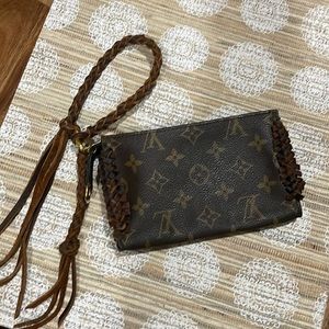 Authentic Vintage Louis Vuitton pochette that was repurposed with leather fringe